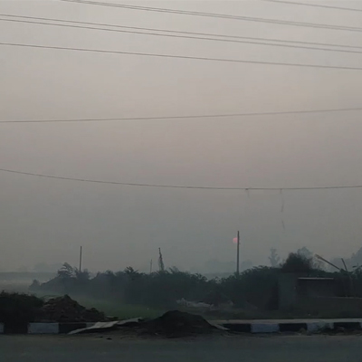 outside-view-from-running-car-window-during-sunrise-morning-in-haryana-india