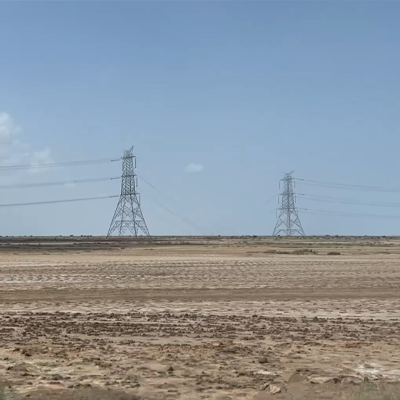 electricity-high-tension-wires-and-poll-above-the-ground-in-india-stock-footage