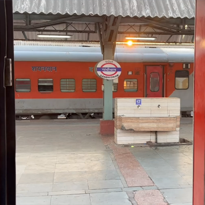 gandhidhaam-railway-station-entry-from-standing-train-indian-railway-stock-footage