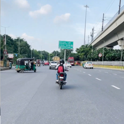 vehicle-running-on-the-road-of-delhi-ncr-indian-stock-footage